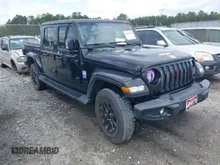 2022 Jeep Gladiator Willys with VIN 1C6HJTAG4NL124735, listed as a IAAI auction lot 41907381 with 24,220 mi miles and . Bid and sale history available at DreamBid. Image 1.