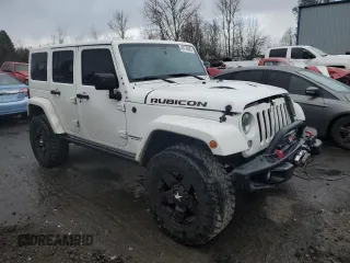 2015 Jeep Wrangler Unlimited Rubicon Hard Rock with VIN 1C4HJWFG8FL647910, listed as a Copart auction lot 46716605 with 48,139 mi miles and Salvage Title. Bid and sale history available at carsss.com. Image 4.