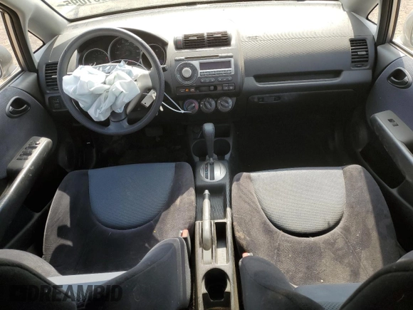 2007 Honda Fit z VIN JHMGD38497S025472, wystawiony jako Copart lot #55901095 z przebiegiem 120 216 mil mil oraz Szkoda całkowita • Salvage title. Historia ofert i sprzedaży dostępna na DreamBid. Obrazek 8.
