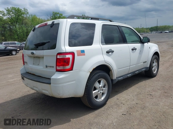 2008 Ford Escape Hybrid with VIN 1FMCU59H38KC38282, listed as a IAAI auction lot 42136889 with 233,123 mi miles. Bid and sale history available at carsss.com. Image 4.