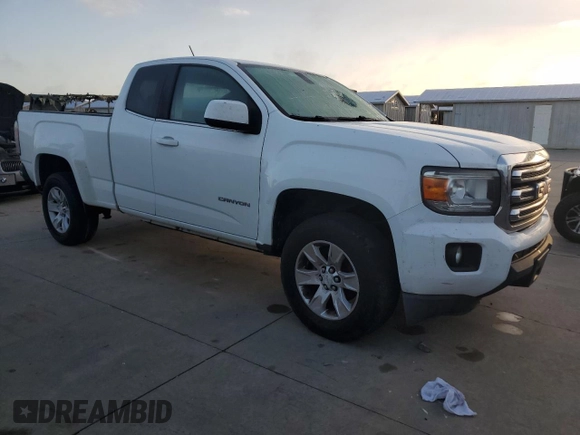 2015 GMC Canyon 2WD SLE with VIN 1GTH5BEA2F1131855, listed as a Copart auction lot 83924504 with 0 mi miles and Salvage Title. Bid and sale history available at carsss.com. Image 4.