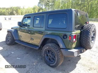 2023 Jeep Wrangler Sport S with VIN 1C4HJXDN0PW695795, listed as a IAAI auction lot 41974691 with 32,734 mi miles and . Bid and sale history available at DreamBid. Image 3.