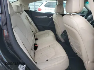 2015 Maserati Ghibli z VIN ZAM57XSA5F1129866, wystawiony jako Copart lot #51738015 z przebiegiem Nie podano mil oraz Szkoda całkowita • Salvage title. Historia ofert i sprzedaży dostępna na DreamBid. Obrazek 10.