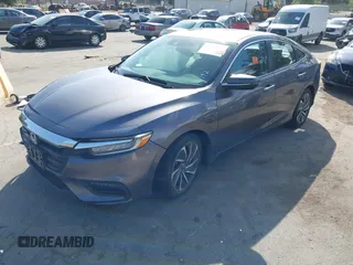 2019 Honda Insight Touring with VIN 19XZE4F95KE001192, listed as a IAAI auction lot 41956216 with Not Provided miles and . Bid and sale history available at carsss.com. Image 2.