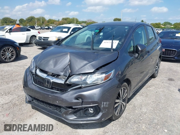 2019 Honda Fit EX with VIN 3HGGK5H87KM735382, listed as a IAAI auction lot 41972963 with 119,006 mi miles and . Bid and sale history available at DreamBid. Image 6.