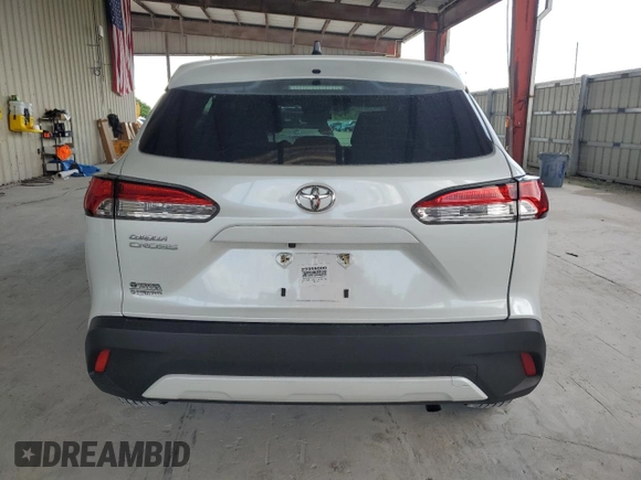 2023 Toyota Corolla Cross L z VIN 7MUAAAAG7PV053889, wystawiony jako Copart lot #61677525 z przebiegiem 27 970 mil mil oraz Szkoda całkowita • Salvage title. Historia ofert i sprzedaży dostępna na DreamBid. Obrazek 6.