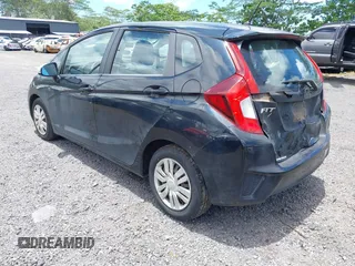 2017 Honda Fit LX z VIN 3HGGK5H58HM706357, wystawiony jako IAAI lot #42371826 z przebiegiem 91 099 mil mil oraz . Historia ofert i sprzedaży dostępna na DreamBid. Obrazek 3.