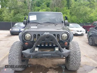2013 Jeep Wrangler Unlimited Rubicon with VIN 1C4BJWFG5DL652050, listed as a IAAI auction lot 42451954 with 107,110 mi miles and . Bid and sale history available at DreamBid. Image 12.