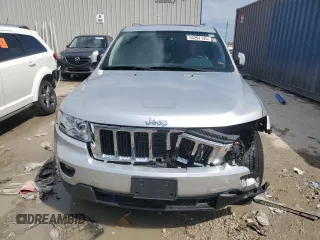 2011 Jeep Grand Cherokee 70th Anniversary with VIN 1J4RR4GG5BC731297, listed as a Copart auction lot 53297135 with 233,392 mi miles and Non Repairable. Bid and sale history available at carsss.com. Image 5.