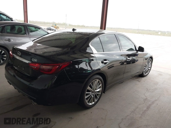 2023 Infiniti Q50 Luxe with VIN JN1EV7BPXPM512588, listed as a IAAI auction lot 41819661 with 30,817 mi miles and . Bid and sale history available at DreamBid. Image 4.