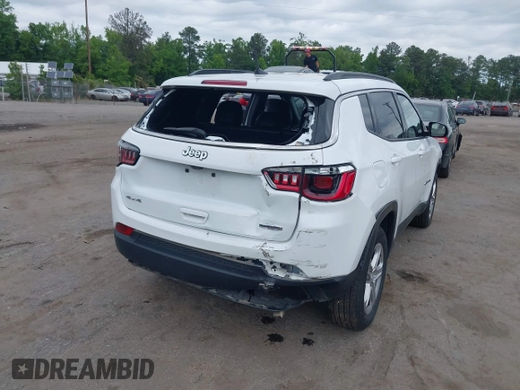 2024 Jeep Compass Latitude with VIN 3C4NJDBN9RT607209, listed as a IAAI auction lot 42233206 with 35,245 mi miles and . Bid and sale history available at DreamBid. Image 4.