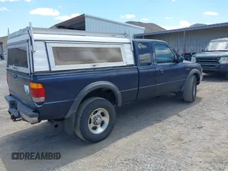 1999 Ford Ranger XLT with VIN 1FTZR15X6XTA66957, listed as a IAAI auction lot 42650632 with 301,523 mi miles and . Bid and sale history available at DreamBid. Image 4.