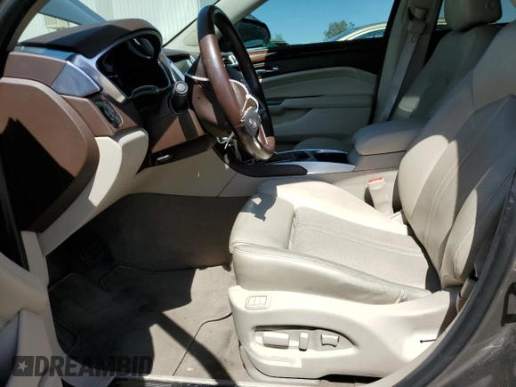 2014 Cadillac SRX Premium Collection z VIN 3GYFNDE37ES644966, wystawiony jako Copart lot #60501715 z przebiegiem 97 231 mil mil oraz Szkoda całkowita • Salvage title. Historia ofert i sprzedaży dostępna na DreamBid. Obrazek 7.