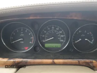 2004 Jaguar XJ VDP with VIN SAJWA74C64SG27143, listed as a Copart auction lot 71373744 with 129,942 mi miles and Salvage Title. Bid and sale history available at carsss.com. Image 9.