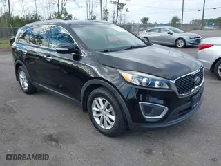 2017 Kia Sorento LX V6 with VIN 5XYPG4A54HG308953, listed as a IAAI auction lot 41604706 with 122,215 mi miles. Bid and sale history available at carsss.com. Image 1.