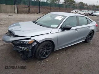 2022 Honda Civic Sport z VIN 2HGFE2F56NH537728, wystawiony jako IAAI lot #41772928 z przebiegiem 38 147 mil mil oraz . Historia ofert i sprzedaży dostępna na DreamBid. Obrazek 2.