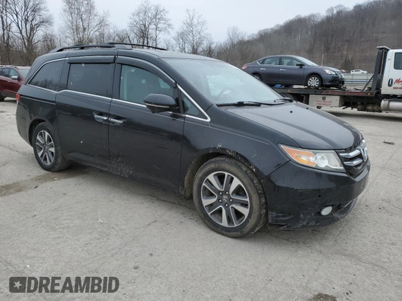 2015 Honda Odyssey Touring Elite with VIN 5FNRL5H97FB112237, listed as a Copart auction lot 44789195 with 152,165 mi miles and Salvage Title. Bid and sale history available at DreamBid. Image 4.