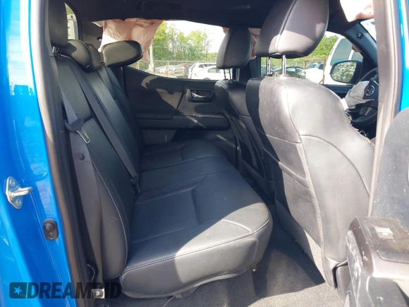 2021 Toyota Tacoma SR z VIN 3TYCZ5AN7MT008274, wystawiony jako IAAI lot #42091508 z przebiegiem 59 371 mil mil oraz . Historia ofert i sprzedaży dostępna na DreamBid. Obrazek 8.