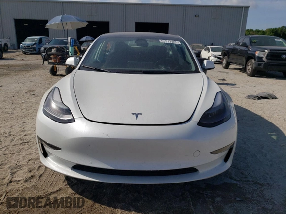 2022 Tesla Model 3 with VIN 5YJ3E1EA0NF320658, listed as a Copart auction lot 53317305 with 27,839 mi miles and Non Repairable. Bid and sale history available at carsss.com. Image 5.