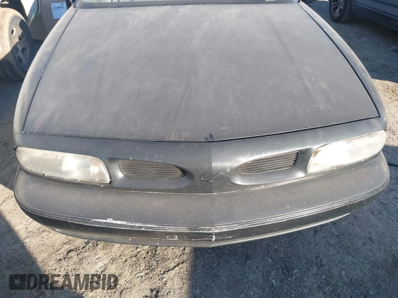 1998 Oldsmobile 88 LS z VIN 1G3HN52K2W4849130, wystawiony jako IAAI lot #41496592 z przebiegiem Nie podano mil oraz . Historia ofert i sprzedaży dostępna na DreamBid. Obrazek 6.