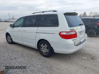2007 Honda Odyssey EX-L with VIN 5FNRL38607B403903, listed as a IAAI auction lot 42074718 with 148,816 mi miles. Bid and sale history available at carsss.com. Image 3.