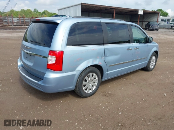 2012 Chrysler Town & Country Touring L with VIN 2C4RC1CG1CR393269, listed as a IAAI auction lot 42101848 with 144,881 mi miles and . Bid and sale history available at carsss.com. Image 4.