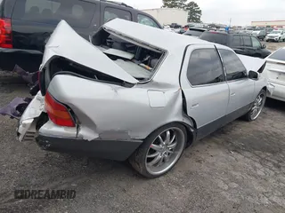 1995 Lexus LS 400 z VIN JT8UF22E9S0029003, wystawiony jako IAAI lot #41595809 z przebiegiem Nie podano mil oraz . Historia ofert i sprzedaży dostępna na DreamBid. Obrazek 4.
