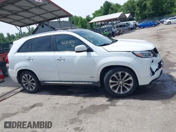 2014 Kia Sorento SX z VIN 5XYKWDA70EG541044, wystawiony jako IAAI lot #42301841 z przebiegiem 196 550 mil mil oraz . Historia ofert i sprzedaży dostępna na DreamBid. Obrazek 13.