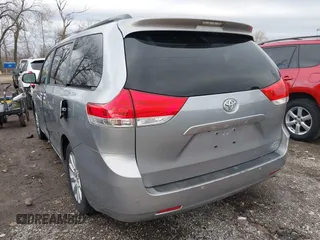 2013 Toyota Sienna XLE with VIN 5TDDK3DC7DS056599, listed as a IAAI auction lot 41736510 with 120,230 mi miles and . Bid and sale history available at DreamBid. Image 3.