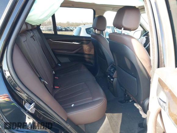 2016 BMW X5 xDrive40e z VIN 5UXKT0C54G0S78884, wystawiony jako IAAI lot #41208477 z przebiegiem 90 181 mil mil oraz . Historia ofert i sprzedaży dostępna na DreamBid. Obrazek 8.