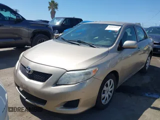 2009 Toyota Corolla with VIN 1NXBU40E59Z156570, listed as a IAAI auction lot 42417219 with 157,388 mi miles and . Bid and sale history available at DreamBid. Image 2.