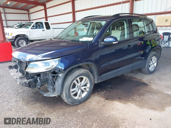 2016 Volkswagen Tiguan S with VIN WVGAV7AX5GW584747, listed as a IAAI auction lot 41853488 with 92,579 mi miles and . Bid and sale history available at DreamBid. Image 2.