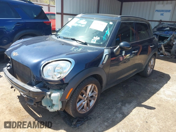 2014 MINI Countryman S with VIN WMWZC3C5XEWP27221, listed as a IAAI auction lot 41957817 with 112,353 mi miles and . Bid and sale history available at DreamBid. Image 18.