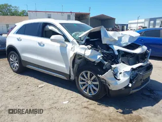 2020 Cadillac XT4 FWD Premium Luxury with VIN 1GYFZCR49LF138493, listed as a IAAI auction lot 41894823 with 49,000 mi miles. Bid and sale history available at carsss.com. Image 1.