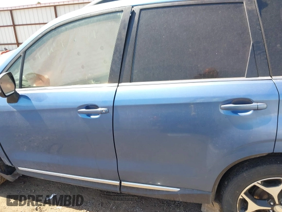 2015 Subaru Forester XT Touring with VIN JF2SJGWC7FH448103, listed as a IAAI auction lot 42182003 with 157,272 mi miles and . Bid and sale history available at DreamBid. Image 14.