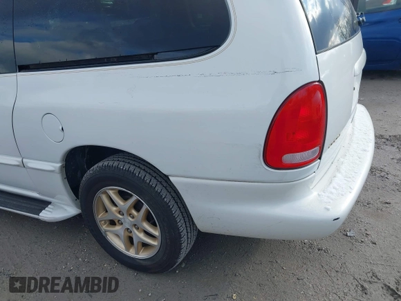 1998 Dodge Caravan LE with VIN 1B4GP54L7WB698340, listed as a IAAI auction lot 41252162 with 99,073 mi miles and . Bid and sale history available at carsss.com. Image 6.