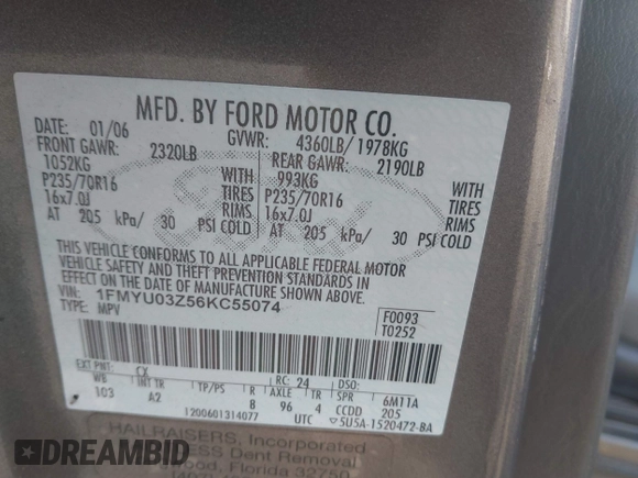 2006 Ford Escape XLT with VIN 1FMYU03Z56KC55074, listed as a IAAI auction lot 41473454 with 164,399 mi miles. Bid and sale history available at carsss.com. Image 9.