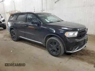 2015 Dodge Durango Special Service with VIN 1C4RDJFG2FC193572, listed as a Copart auction lot 48817575 with 210,420 mi miles and Salvage title. Bid and sale history available at DreamBid. Image 4.