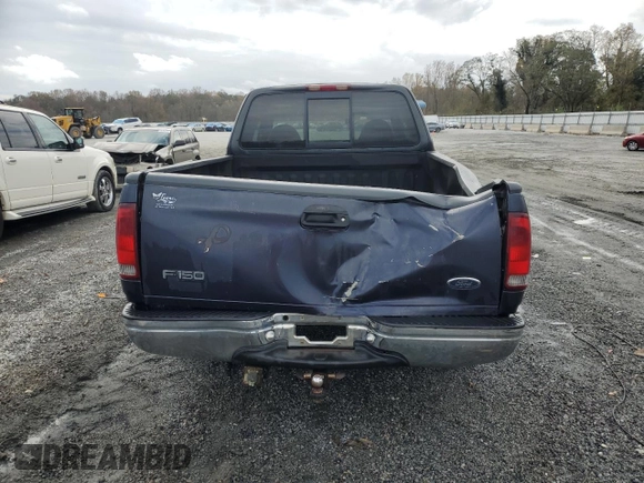 1999 Ford F-150 XL with VIN 1FTRX17L6XNB12078, listed as a Copart auction lot 79332914 with 168,591 mi miles and Salvage Title. Bid and sale history available at carsss.com. Image 6.