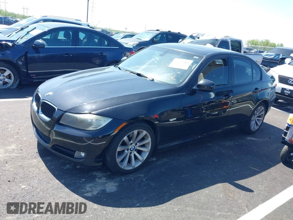 2011 BMW 3 Series 328i with VIN WBAPH7G50BNM56021, listed as a IAAI auction lot 42006563 with 178,919 mi miles. Bid and sale history available at carsss.com. Image 2.