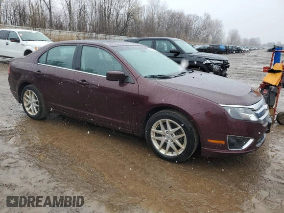 2012 Ford Fusion SEL z VIN 3FAHP0JA6CR431507, wystawiony jako Copart lot #49857795 z przebiegiem 133 680 mil mil oraz Czysty tytuł • Clean title. Historia ofert i sprzedaży dostępna na DreamBid. Obrazek 4.