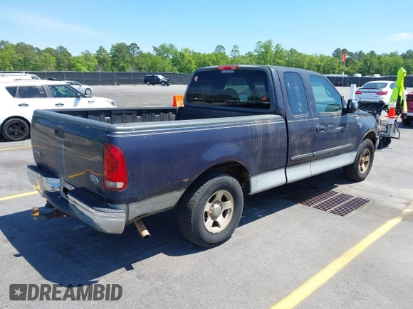 1999 Ford F-150 with VIN 1FTRX17W9XNB32397, listed as a IAAI auction lot 42048746 with 290,179 mi miles and . Bid and sale history available at DreamBid. Image 4.