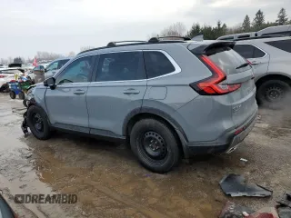 2023 Honda CR-V Sport Touring with VIN 2HKRS6H9XPH208925, listed as a Copart auction lot 46083575 with 63,658 mi miles and Salvage Title. Bid and sale history available at DreamBid. Image 2.