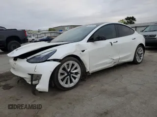 2022 Tesla Model 3 with VIN 5YJ3E1EA1NF143263, listed as a Copart auction lot 53362595 with 115,572 mi miles and Clean Title. Bid and sale history available at DreamBid. Image 1.