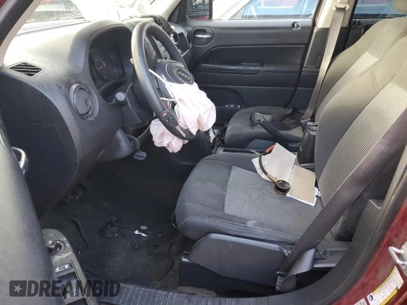 2016 Jeep Patriot Sport SE with VIN 1C4NJRBB7GD779230, listed as a Copart auction lot 88764245 with 197,476 mi miles and Salvage Title. Bid and sale history available at DreamBid. Image 7.