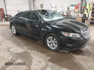 2012 Ford Taurus SEL z VIN 1FAHP2HW2CG144847, wystawiony jako IAAI lot #41836842 z przebiegiem 126 073 mil mil oraz . Historia ofert i sprzedaży dostępna na DreamBid. Obrazek 1.