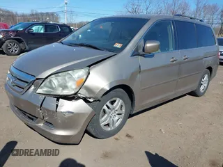 2006 Honda Odyssey EX-L z VIN 5FNRL38736B069969, wystawiony jako IAAI lot #41695311 z przebiegiem 196 218 mil mil oraz . Historia ofert i sprzedaży dostępna na DreamBid. Obrazek 2.