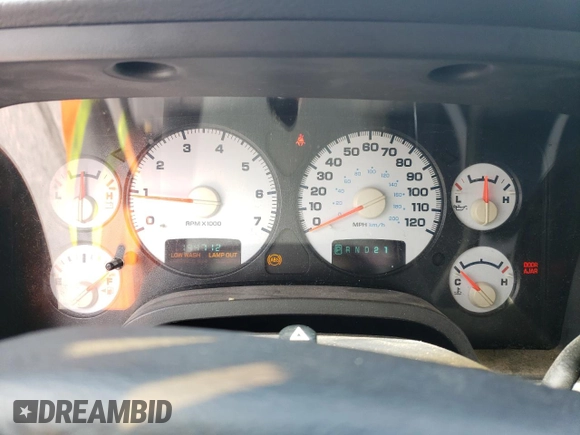 2002 Dodge 1500 z VIN 1D7HU18Z22J217665, wystawiony jako Copart lot #56158055 z przebiegiem 194 712 mil mil oraz Szkoda całkowita • Salvage title. Historia ofert i sprzedaży dostępna na DreamBid. Obrazek 9.
