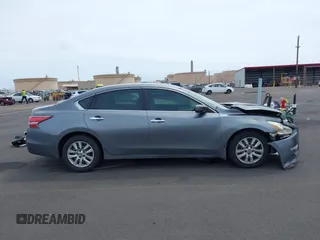2015 Nissan Altima SV with VIN 1N4AL3AP3FC569706, listed as a IAAI auction lot 41820987 with 169,338 mi miles and . Bid and sale history available at DreamBid. Image 14.