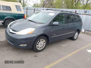 2009 Toyota Sienna XLE with VIN 5TDBK22C19S027059, listed as a IAAI auction lot 42105532 with 241,532 mi miles. Bid and sale history available at carsss.com. Image 2.